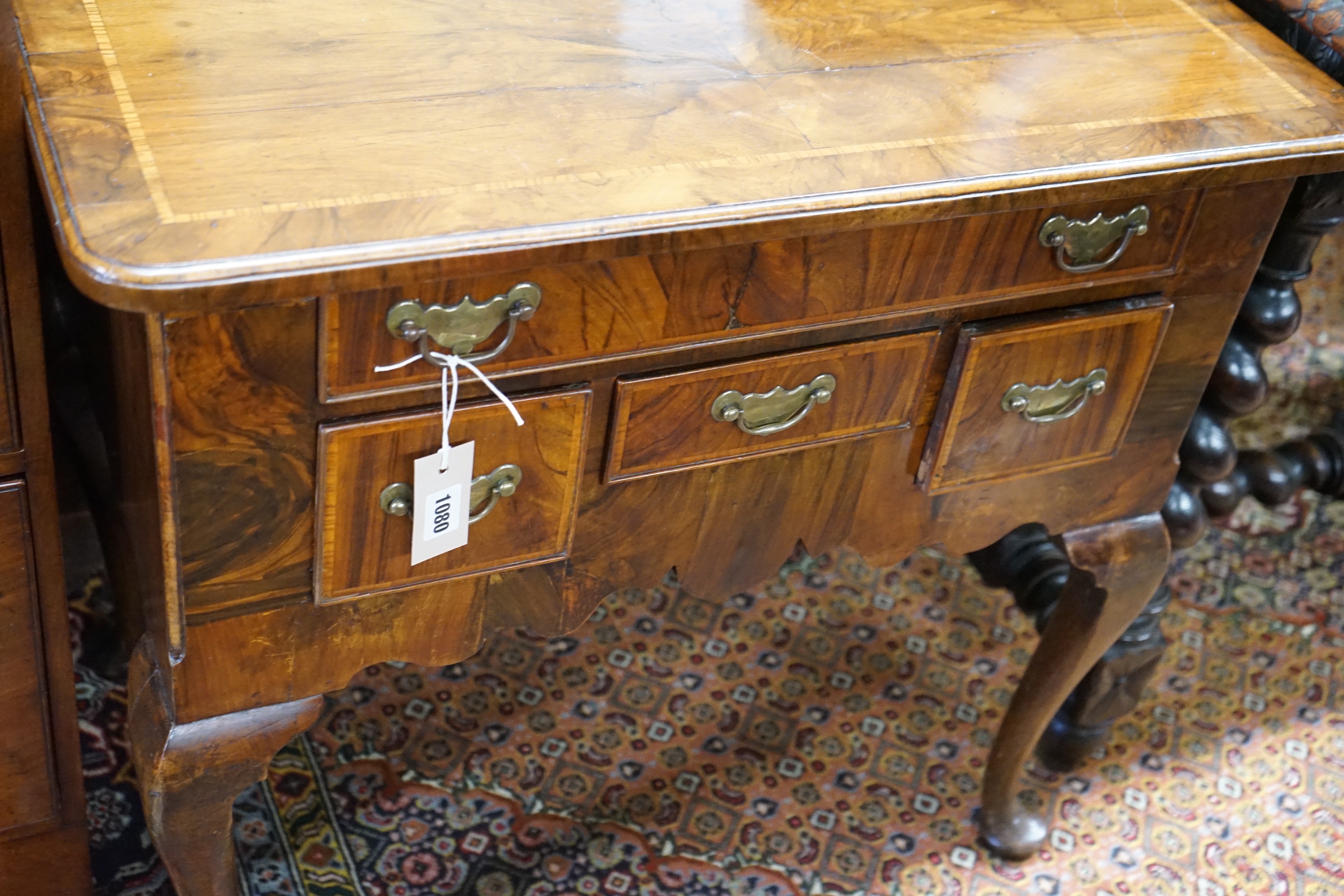 An 18th century banded walnut lowboy, width 75cm, depth 50cm, height 72cm